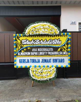 Papan Bunga Duka di Pematang Bandar